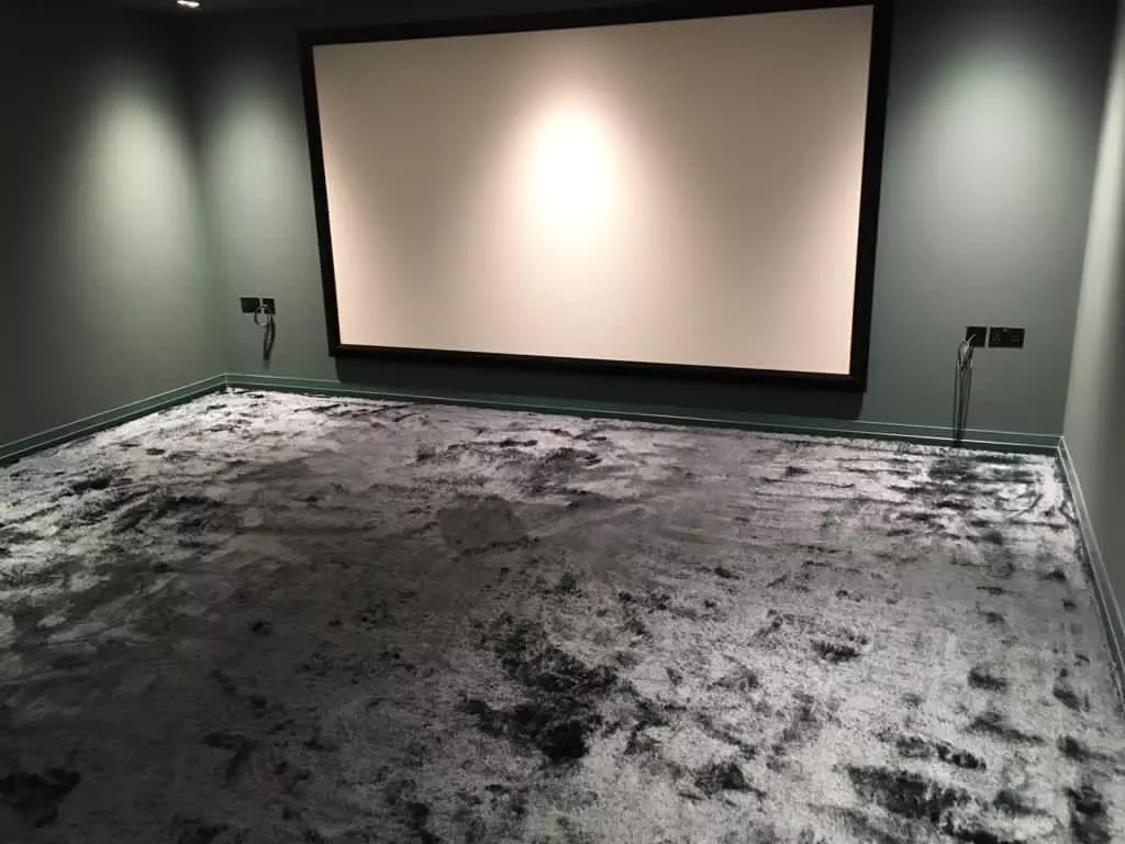 Cinema room in ITC Singapore Ocean luxurious shag pile carpet

